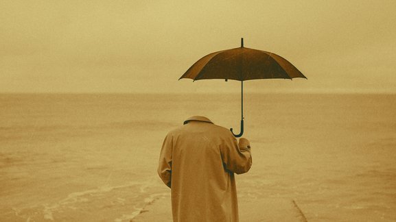 Unsichtbare Person mit Regenschirm